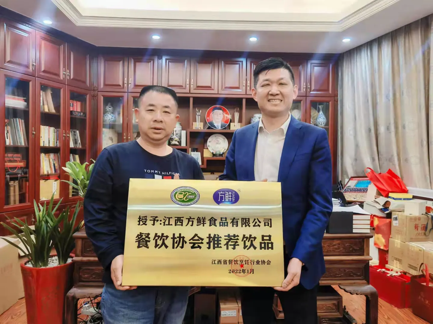 Photograph with a restaurant association beverage recommendation plaque